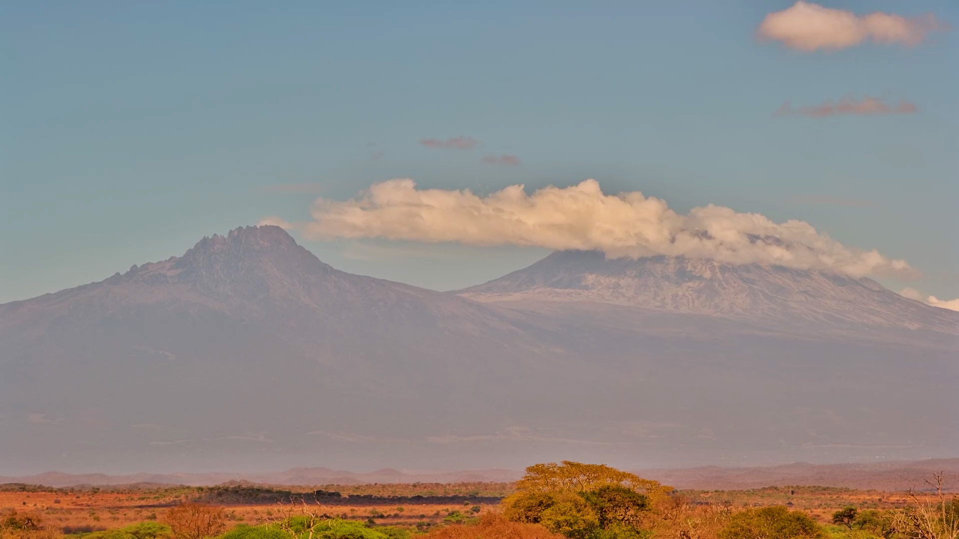 Watch the Clouds Dance Around Kilimanjaro