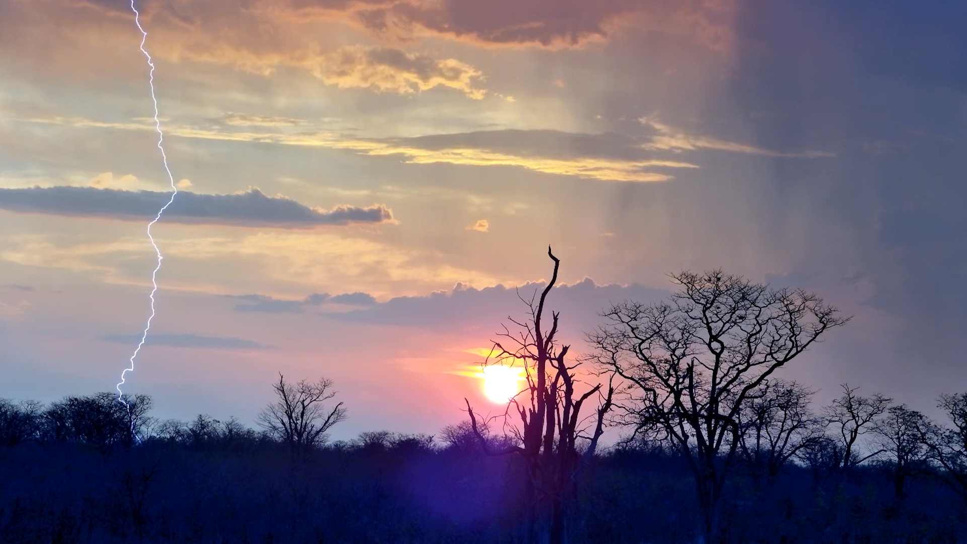 When a Thunderstorm Meets an African Sunset