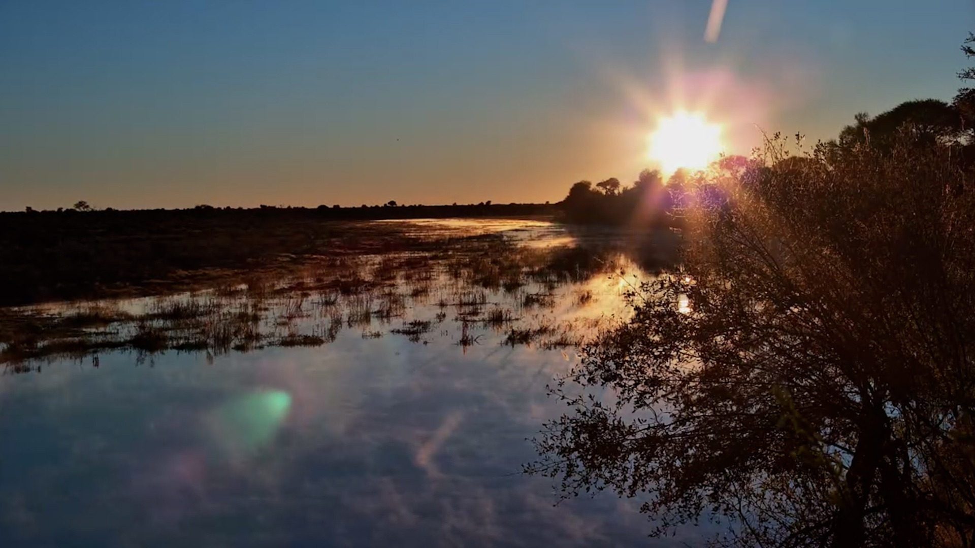 Sunrise Over Moela with Mist on the Water