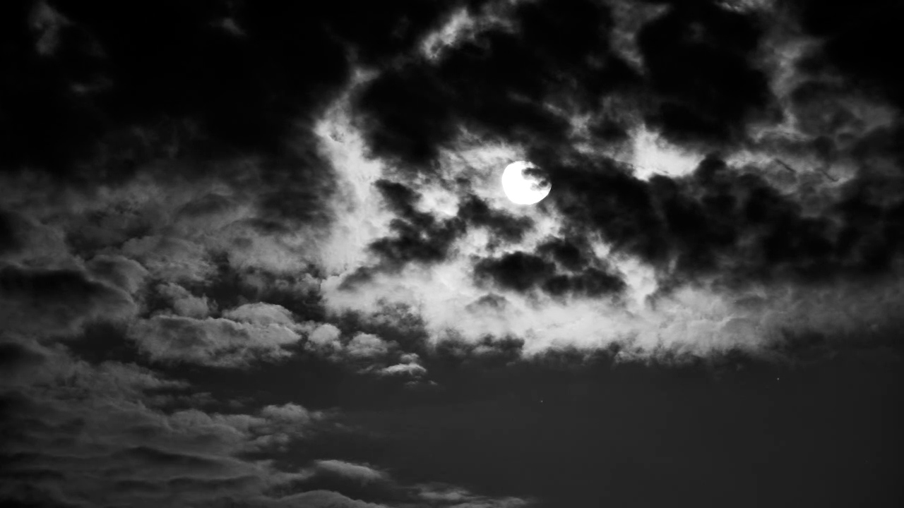 Moonlit Clouds Drift Across the African Night