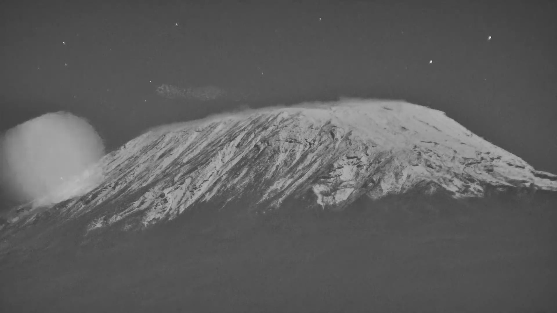 Mount Kilimanjaro Glows Under the Night Sky