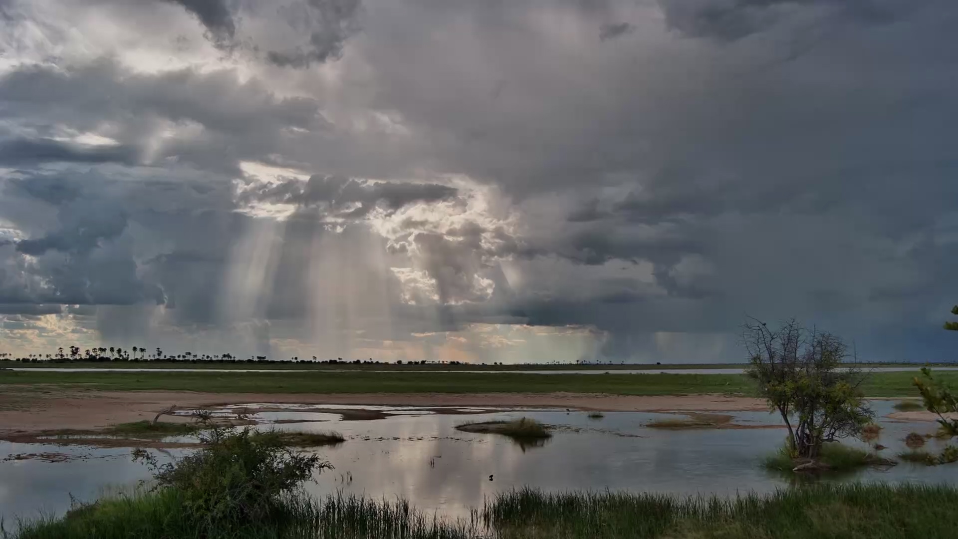 Clouds Over Jacks Camp Waterhole
