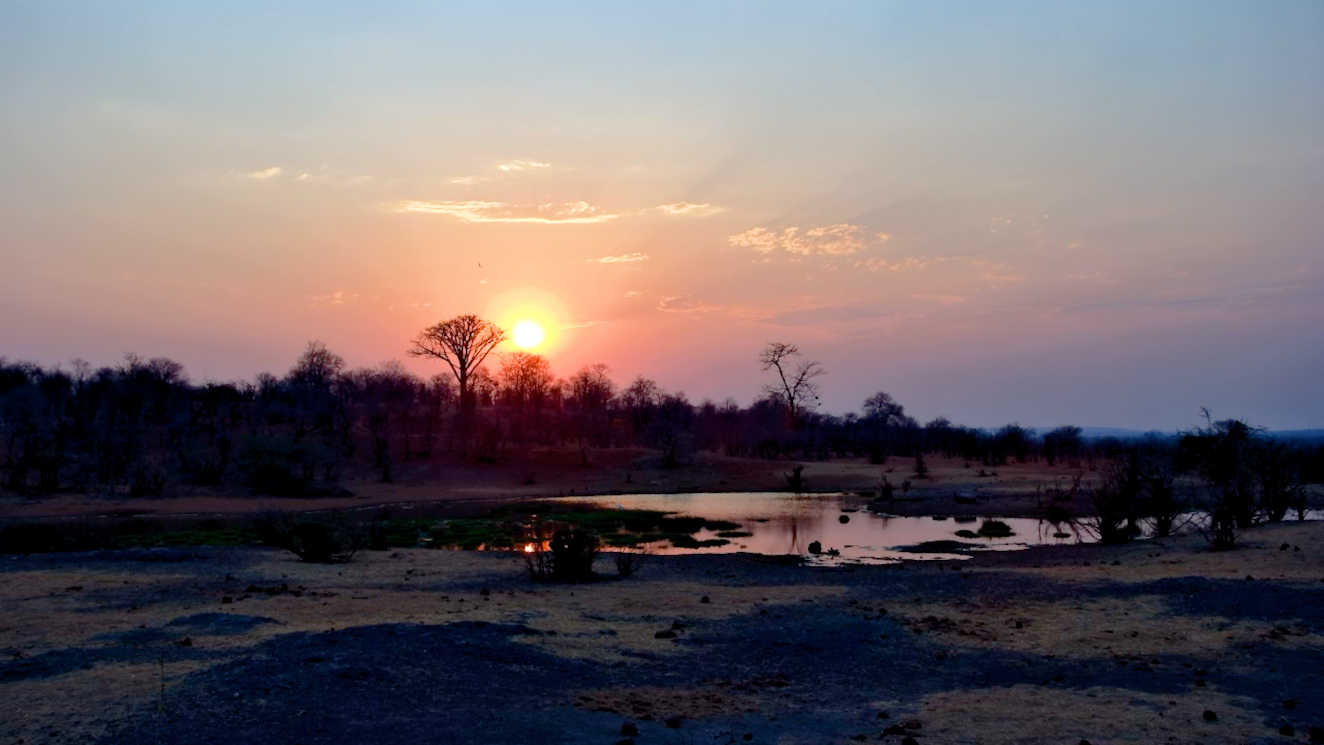 Sunset Over Vic Falls Safari Lodge